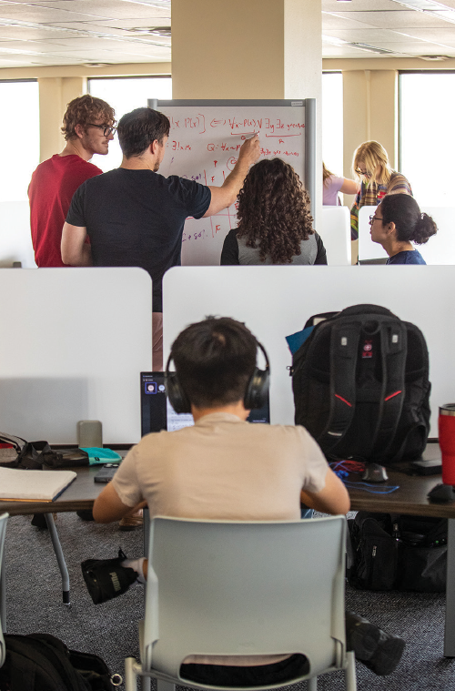 Students using new spaces and equipment to collaborate in the South Lab of MD Anderson Library 