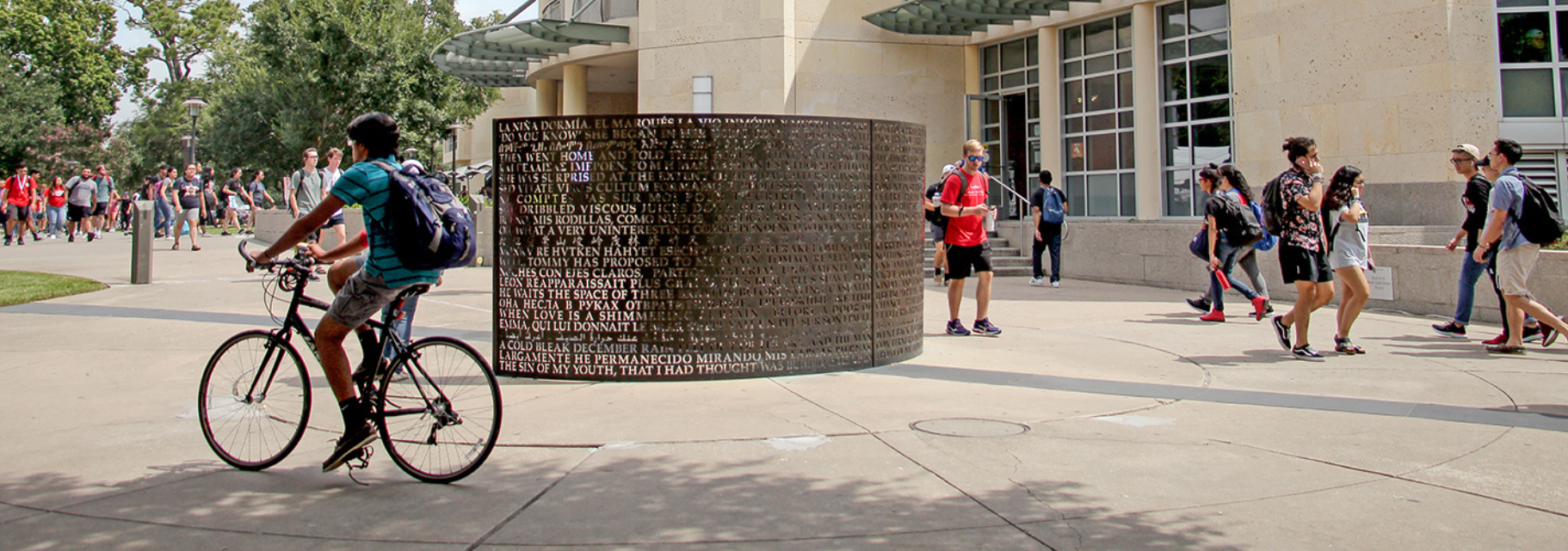 outdoor photo of the front of the MD Anderson Library building taken from Butler Plaza